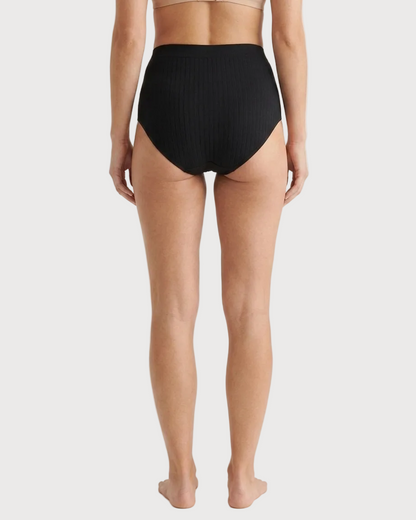 Ribbed Seamless Leakproof Brief shown on a model from the back against a plain light background.